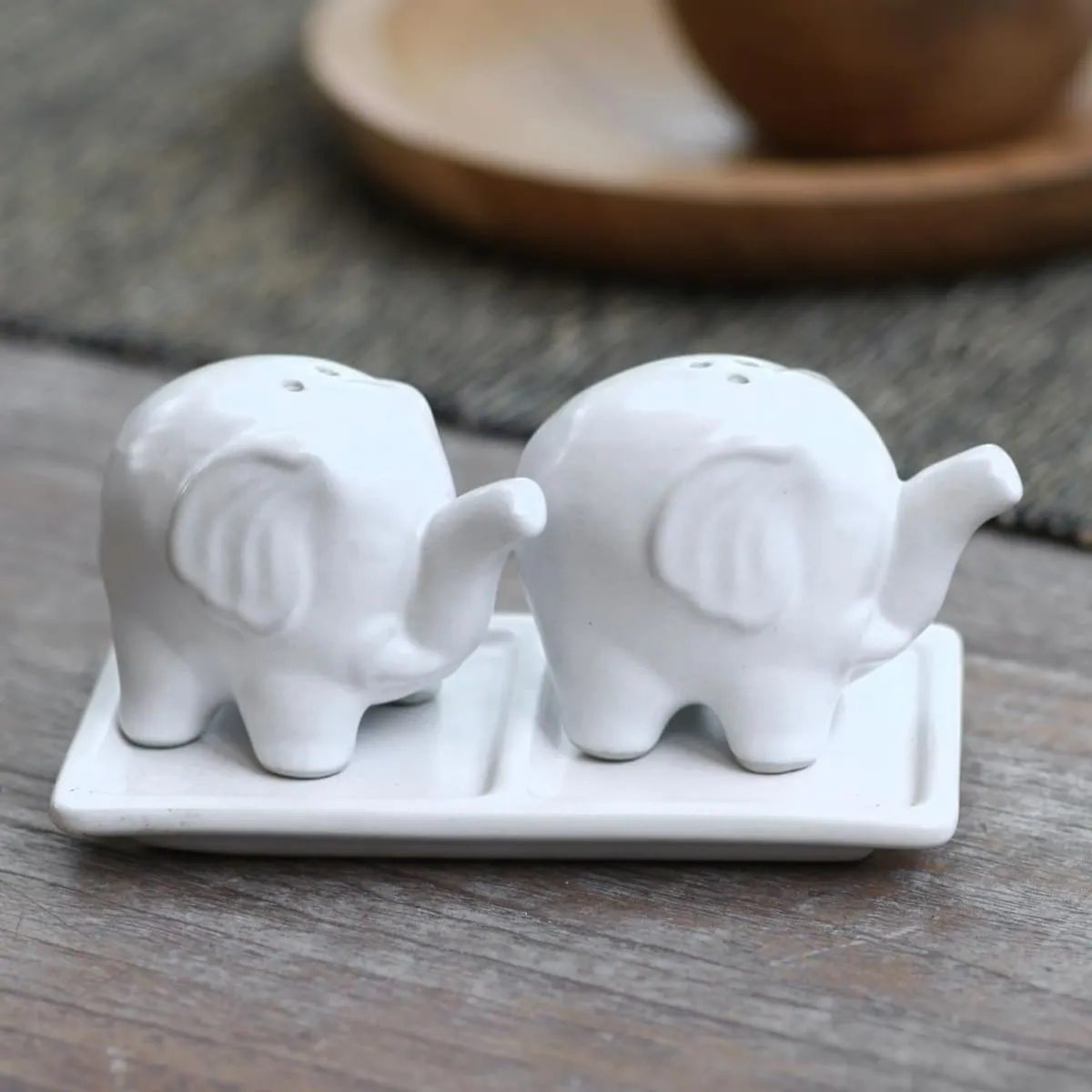 Novica Eager Elephants In White Ceramic Salt And Pepper Set