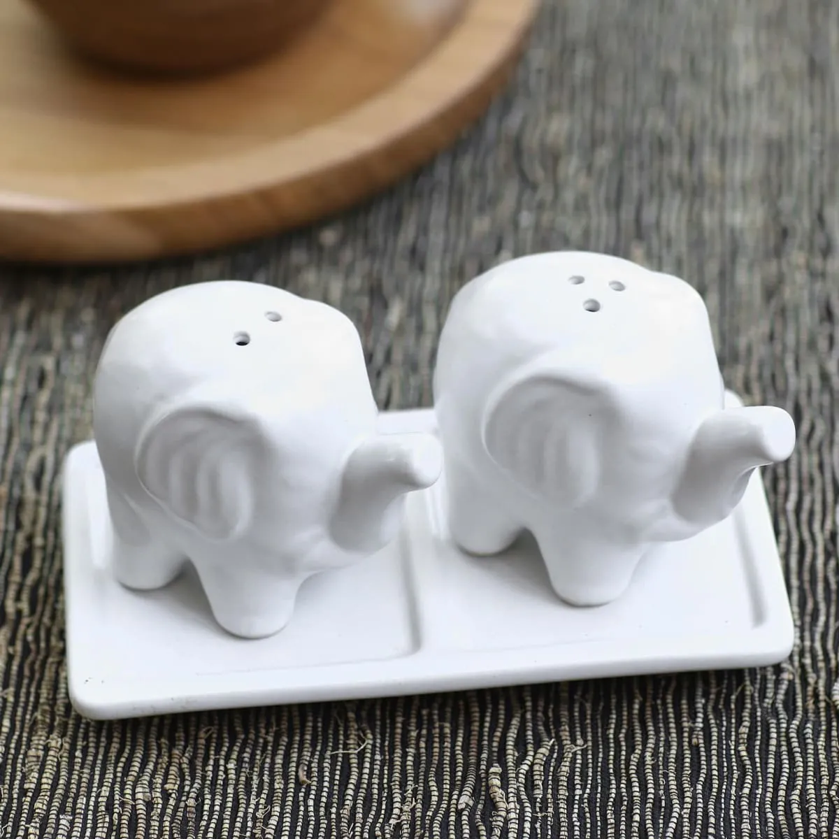 Novica Eager Elephants In White Ceramic Salt And Pepper Set