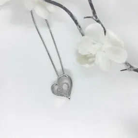 Sterling Silver and a genuine Diamond Heart Necklace